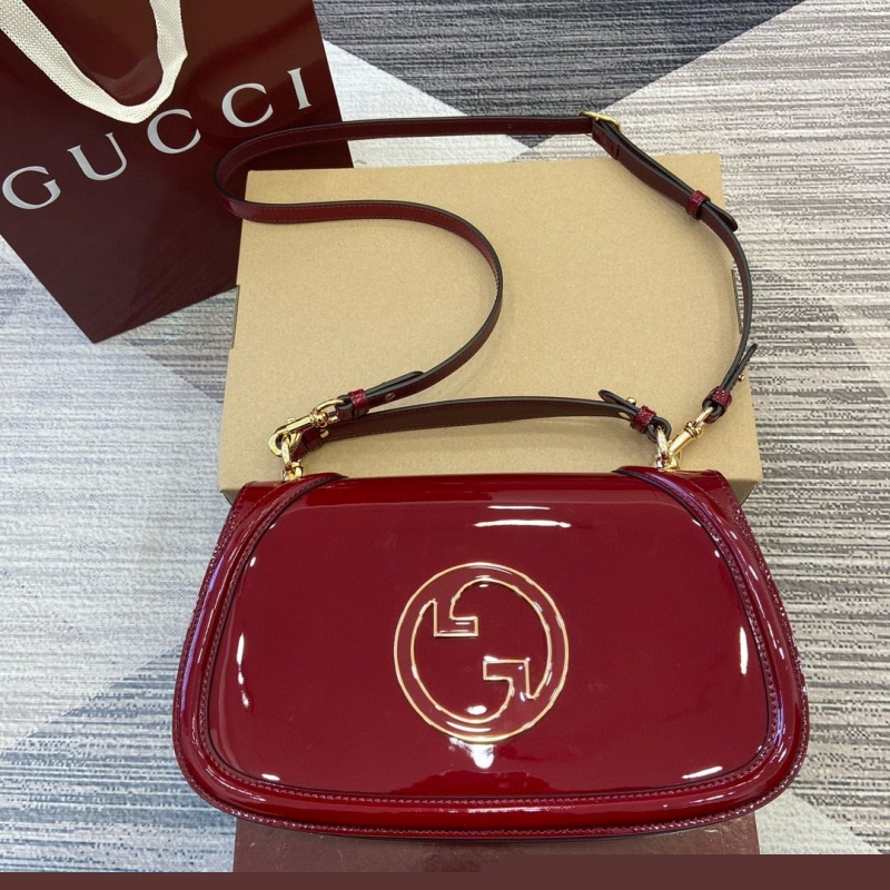 G*u*i top handle bags
